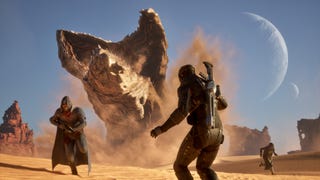 A sandworm chases down two characters in Dune Awakening